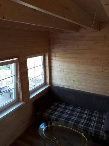 Фото номера Дом для отпуска Дома для отпуска ul.Nowa 14 1.Holzhaus г. Wierzchucino 14